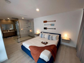 Seaside Luxury 1BDR Condo Paseo Playa Coral D-306